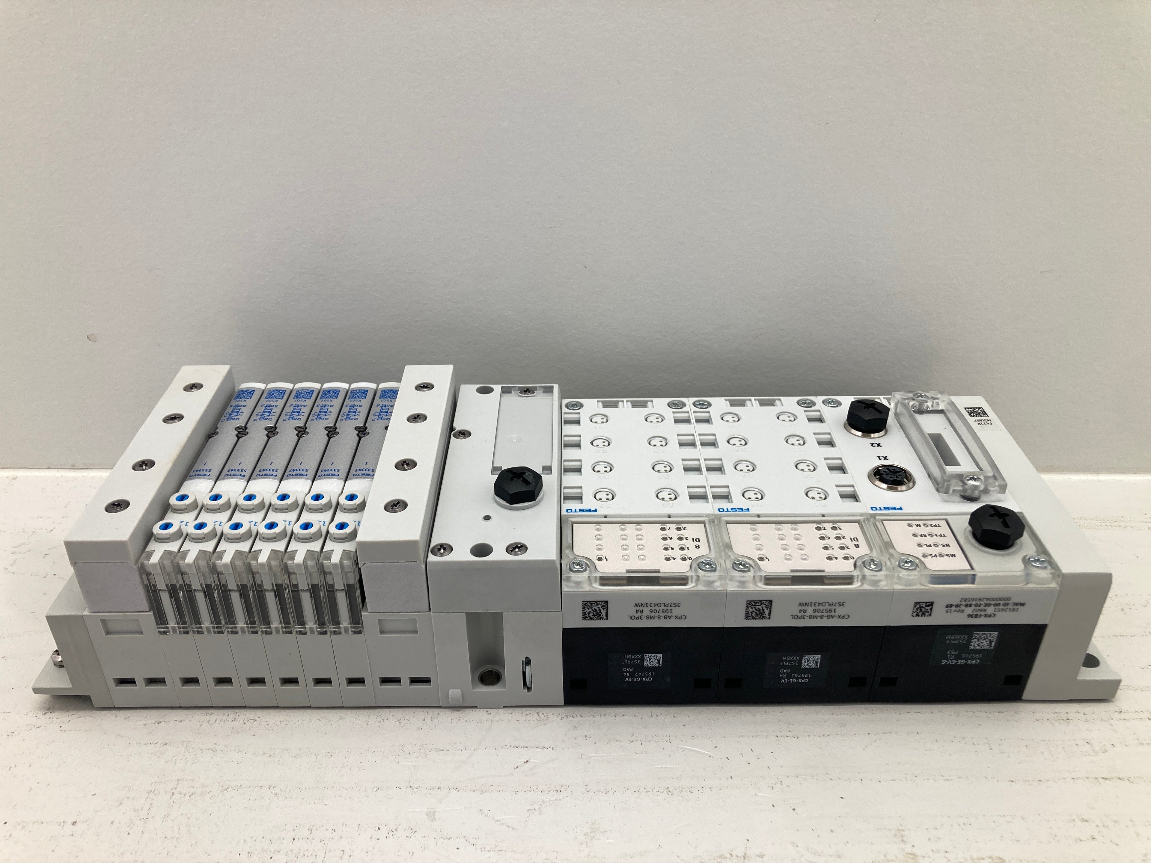 Festo CPX valve manifold assembly with fieldbus module and pneumatic valves
